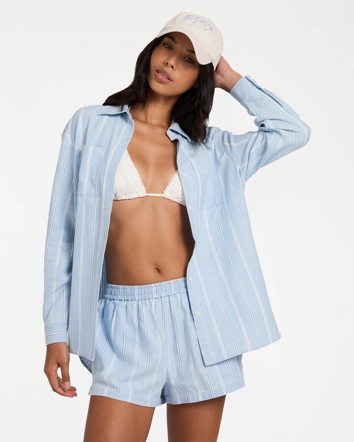 Image of a model wearing Tops. Product name - Billabong Womens Salt Air Stripe Long Sleeve Shirt Multi in Multi colour by brand - Billabong