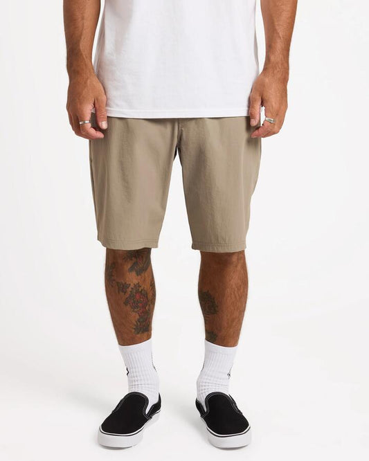 Image of a model wearing Shorts. Product name - Volcom Mens Frickin Cross Shred 20" Hybrid Shorts Brindle in Brindle colour by brand - Volcom