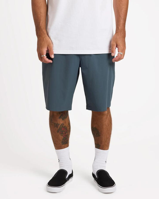 Image of a model wearing Shorts. Product name - Volcom Mens Frickin Cross Shred 20" Hybrid Shorts Dark Slate in Dark Slate colour by brand - Volcom