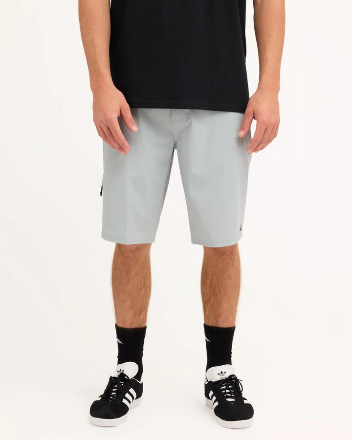 Image of a model wearing Shorts. Product name - Quiksilver Mens Recoil Tech Amphibian 21" Hybrid Shorts Quarry in Quarry colour by brand - Quiksilver
