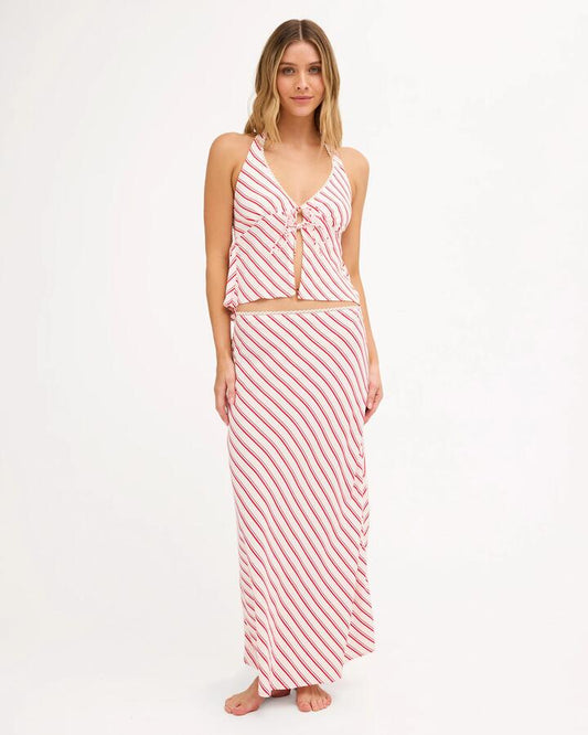 Image of a model wearing Skirts. Product name - Billabong Womens Let It Shine Midi Skirt Hibiscus in Hibiscus colour by brand - Billabong