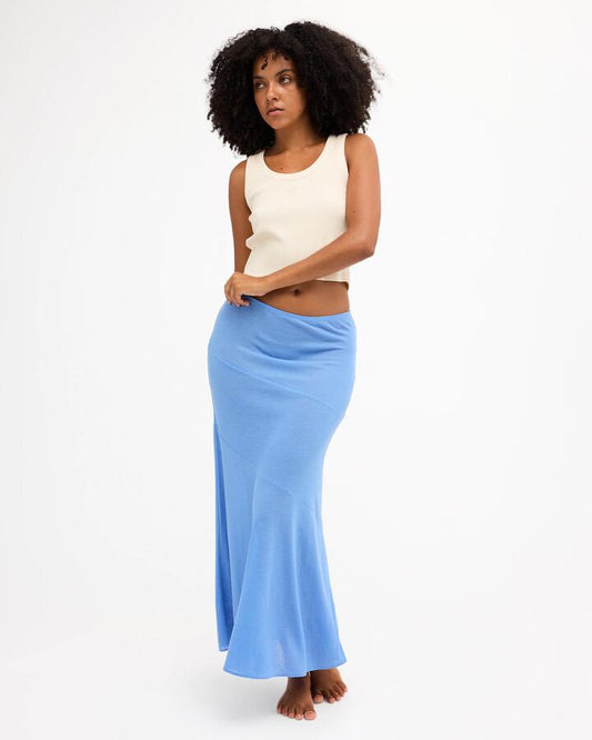 Image of a model wearing Skirts. Product name - Billabong Womens Sea Breeze Maxi Skirt Azure in Azure colour by brand - Billabong