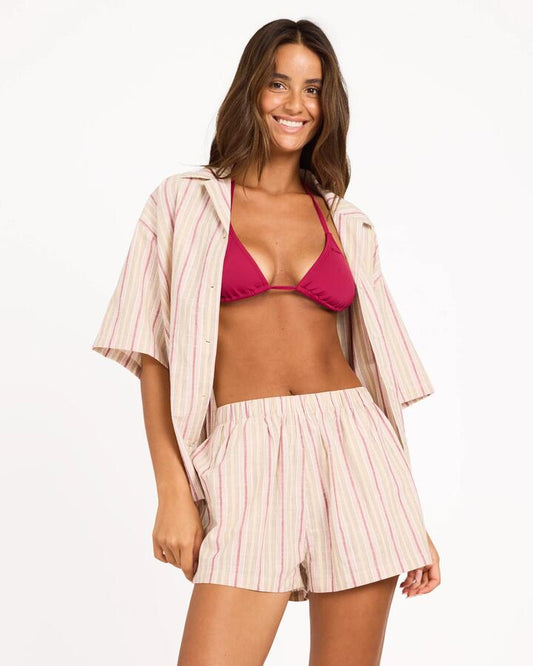 Image of a model wearing Shorts. Product name - Roxy Womens Carter Striped Elastic Waist Shorts Beet Red in Beet Red colour by brand - Roxy
