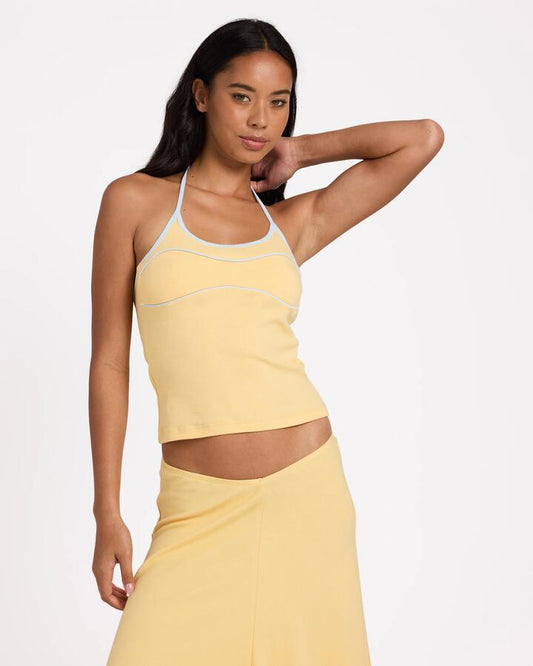 Image of a model wearing Tops. Product name - Billabong Womens Sunbeam Halter Top Sunbeam in Sunbeam colour by brand - Billabong