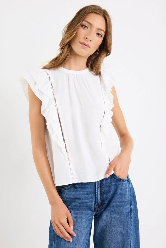 Image of a model wearing Tops. Product name - Exotic Ivory Sheer High Neck Frill Sleeve Top in Ivory colour by brand - Ivy + Jack