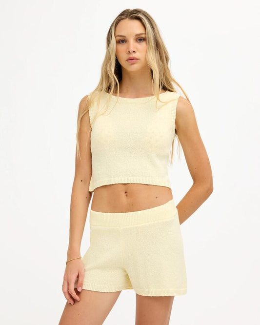 Image of a model wearing Shorts. Product name - Roxy Womens Golden Elastic Waist Shorts Lemon Drop in Lemon Drop colour by brand - Roxy