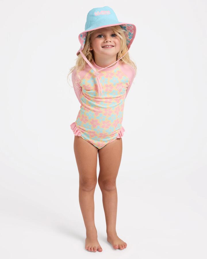 Image of a model wearing Tops. Product name - Billabong Girls 2-7 Sun Petals Long Sleeve One Piece Swimsuit Sunbeam in Sunbeam colour by brand - Billabong
