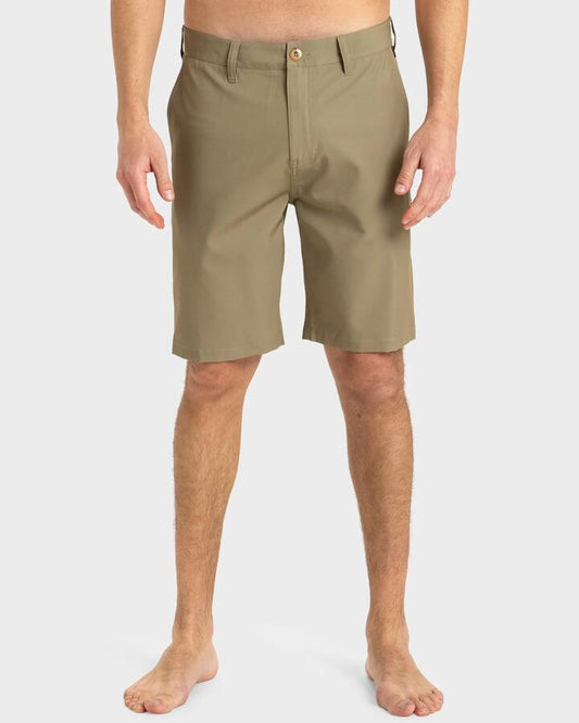 Image of a model wearing Shorts. Product name - Quiksilver Mens Union Amphibian 20" Hybrid Shorts Aloe in Aloe colour by brand - Quiksilver