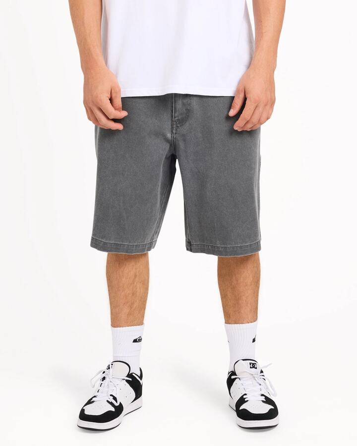 Image of a model wearing Shorts. Product name - Quiksilver Mens Wrench Denim Shorts Iron Gate in Iron Gate colour by brand - Quiksilver