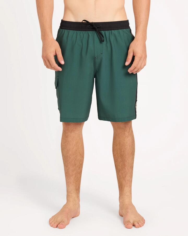 Image of a model wearing Shorts. Product name - Quiksilver Mens Battler 19" Volley Shorts Forest in Forest colour by brand - Quiksilver