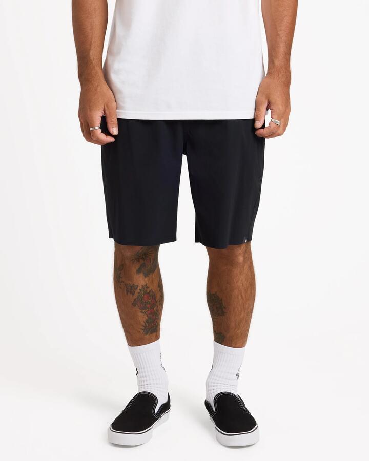 Image of a model wearing Shorts. Product name - Volcom Mens Frickin Cross Shred Hybrid Shorts Black in Black colour by brand - Volcom