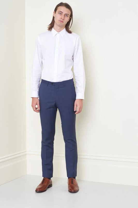 Image of a model wearing Pants. Product name - Prince Of Wales Mod Pant in Grey Check colour by brand - Jack London