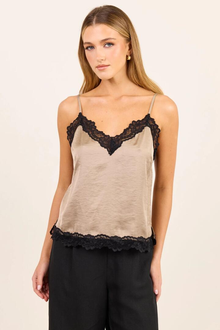 Image of a model wearing Tops. Product name - Nocturne Taupe Satin Lace Trim Cami in Taupe colour by brand - Stories be Told