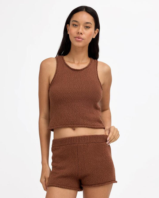 Image of a model wearing Tops. Product name - Billabong Womens All Day Me Knit Tank Top Dark Choc in Dark Choc colour by brand - Billabong