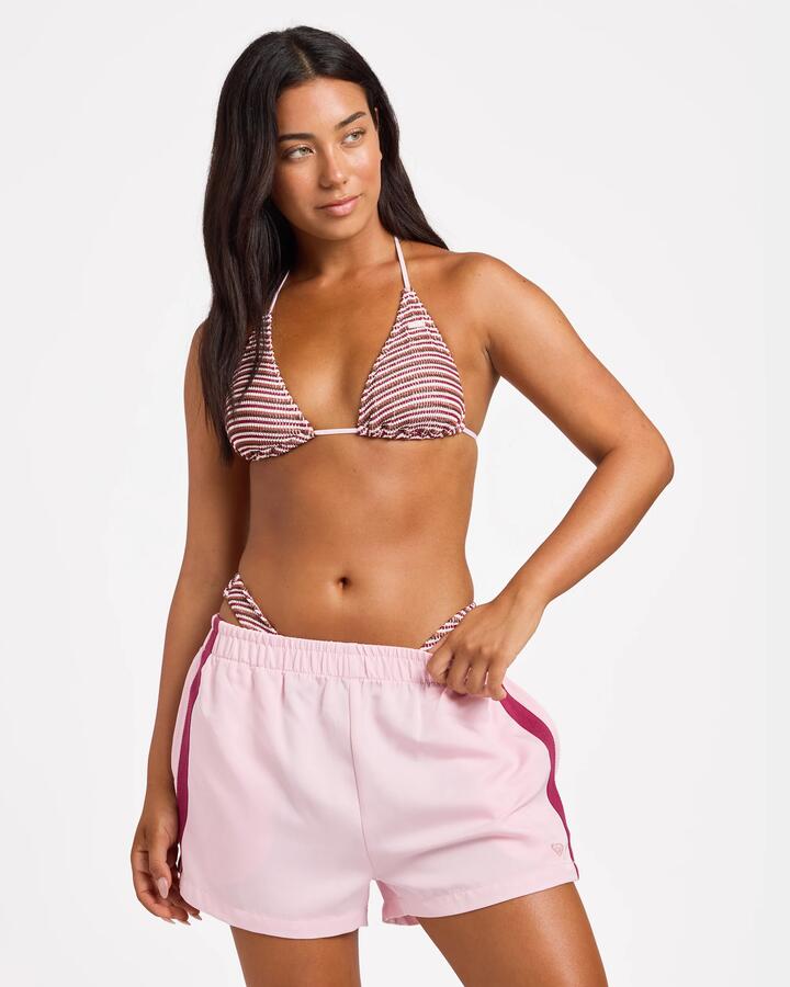 Image of a model wearing Shorts. Product name - Roxy Womens Colt Elastic Waist Shorts Powder Pink in Powder Pink colour by brand - Roxy