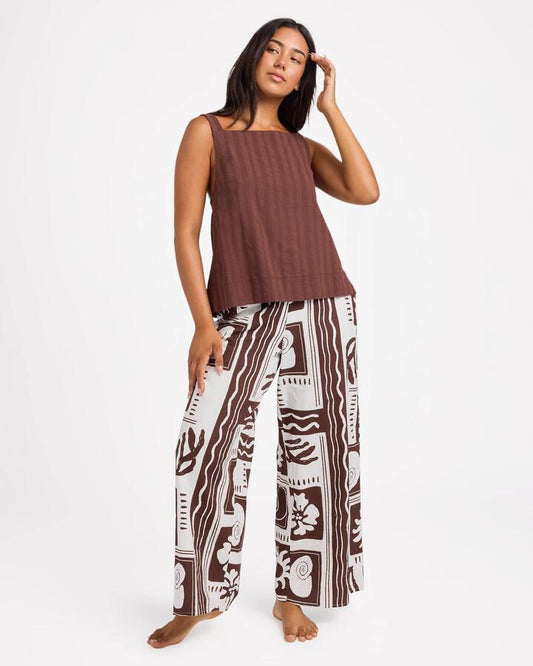 Image of a model wearing Pants. Product name - Roxy Womens Cowrie Elastic Waist Pants Coconut Milk in Coconut Milk colour by brand - Roxy