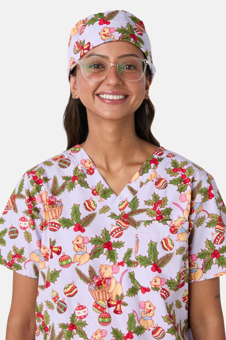 Image of a model wearing Uniforms & Workwear. Product name - Festive Mice Scrub Hat in Lilac colour by brand - Scrubs With Love