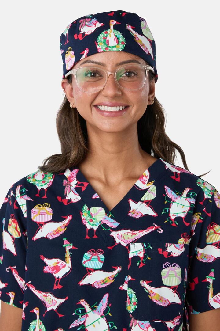 Image of a model wearing Uniforms & Workwear. Product name - Christmas Goose Scrub Hat in Navy colour by brand - Gorman