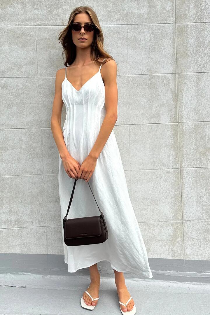 Image of Dresses. Product name - Hourly Ivory Linen Blend Strappy Pleat Maxi Dress in Ivory colour by brand - RE:UNION Label