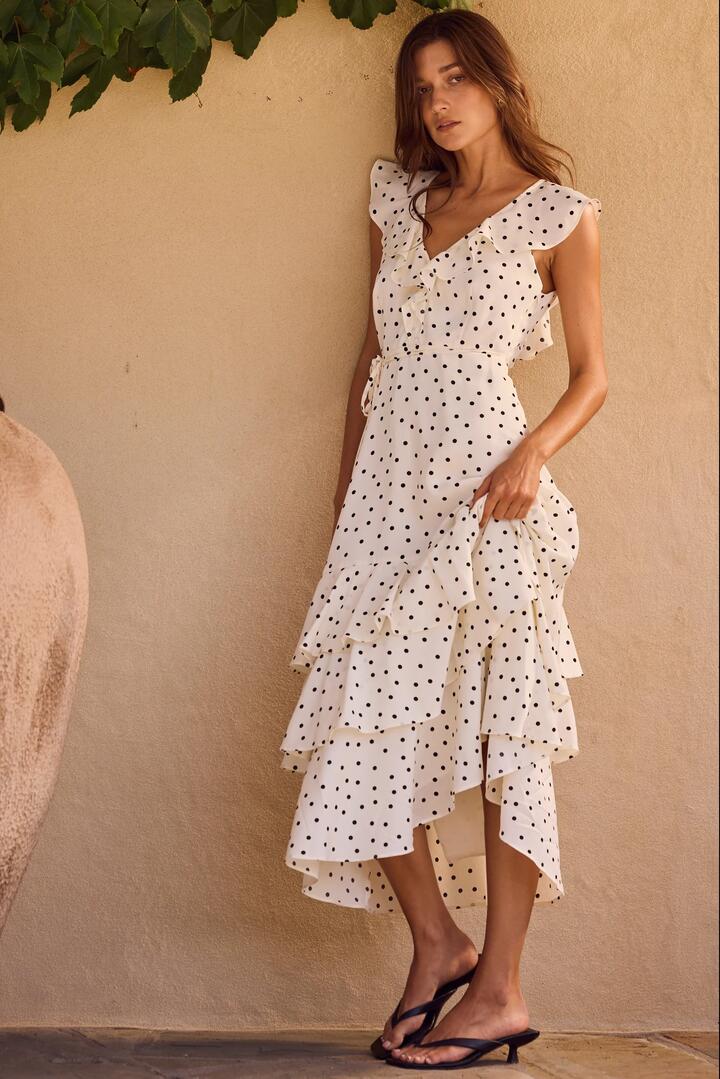Image of Dresses. Product name - Everly Cream Polka Dot Flutter Sleeve Tiered Maxi Dress in Cream Polka Dot colour by brand - By Rosa.