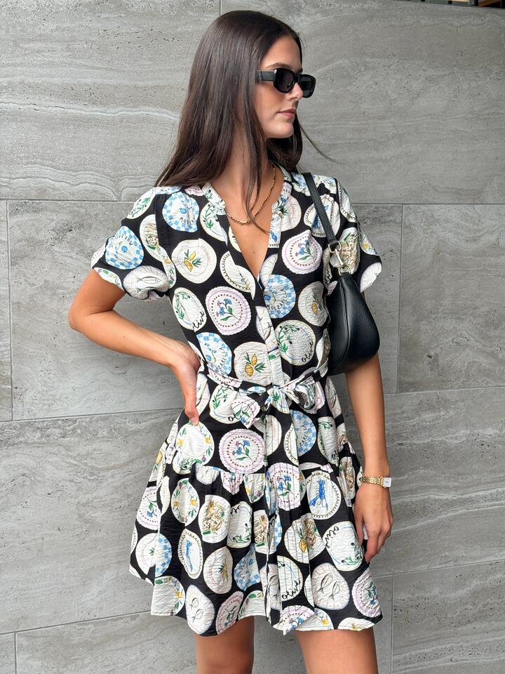 Image of Dresses. Product name - Adored Black Holiday Print Short Sleeve Button Front Mini Dress in Black Holiday Print colour by brand - By Rosa.