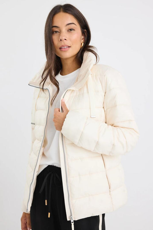 Image of Coats & Jackets. Product name - Caption Ecru Slimline Drawcord Puffer Jacket in Ecru colour by brand - Among the Brave