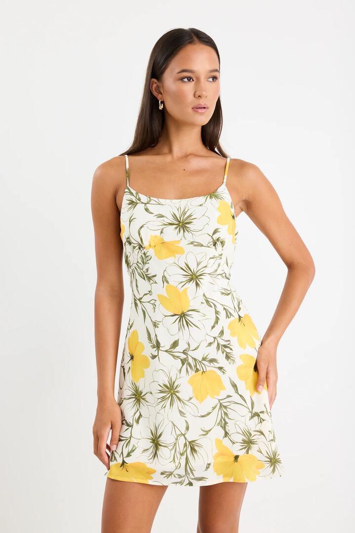 Image of Dresses. Product name - Sweetest Buttercup Floral Strappy Bias Mini Dress in Buttercup Floral colour by brand - Georgia Zoe