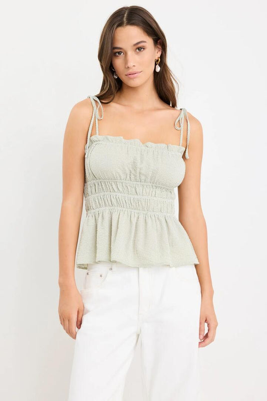 Image of a model wearing Tops. Product name - Musings Sage Gingham Tie Strap Cami in Sage Gingham colour by brand - Among the Brave