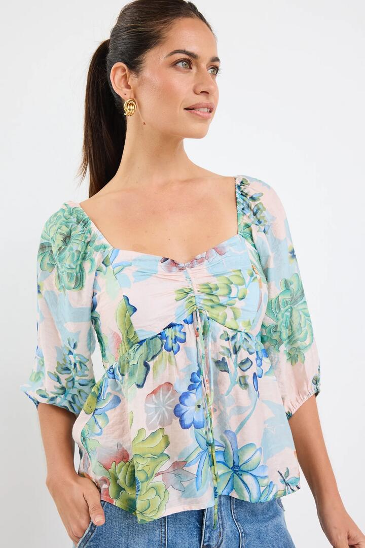 Image of a model wearing Tops. Product name - Healing Blue Posy Print Sweetheart Neck Short Sleeve Top in Blue Posy Print colour by brand - Ivy + Jack