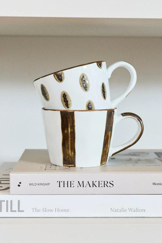 Image of Kitchen & Dining. Product name - Zanzibar Spotted Brown and White Mug in White colour by brand - CC Interiors