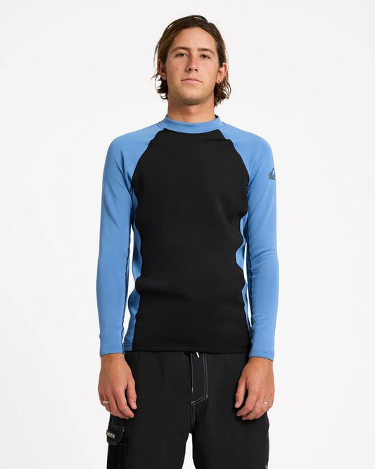 Image of a model wearing Tops. Product name - Quiksilver Mens Everyday Heat Long Sleeve Rash Vest Quiet Harbor in Quiet Harbor colour by brand - Quiksilver