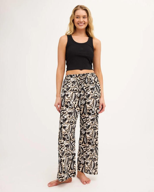 Image of a model wearing Pants. Product name - Billabong Womens Soul Dream Elastic Waist Pants Black Pebble in Black Pebble colour by brand - Billabong