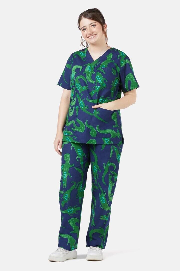 Image of a model wearing Uniforms & Workwear. Product name - Crocs Scrub Set in Print colour by brand - Gorman