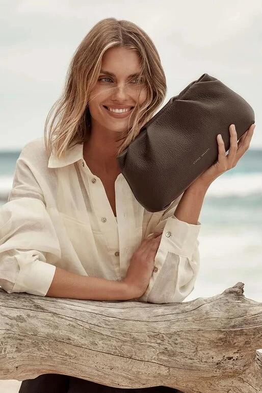 Image of Bags. Product name - The Moment Cocoa Pleated Leather Clutch in Cocoa colour by brand - Status Anxiety