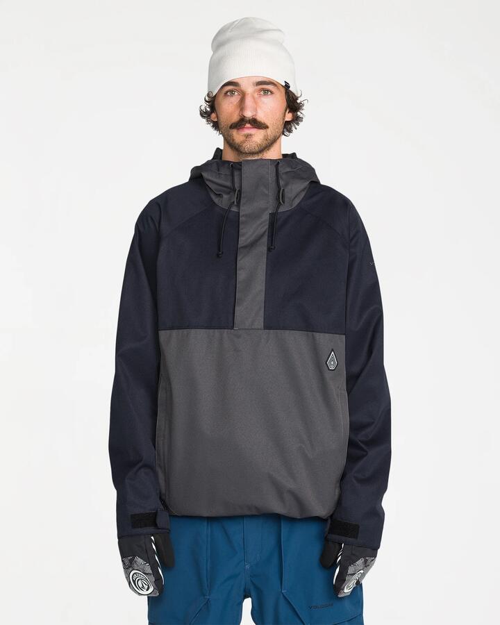 Image of a model wearing Outerwear. Product name - Volcom Mens Hossegor 20K Pullover Black in Black colour by brand - Volcom