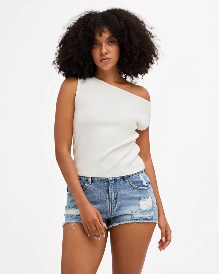 Image of a model wearing Tops. Product name - Billabong Womens Repeat Tank Top Salt Crystal in Salt Crystal colour by brand - Billabong