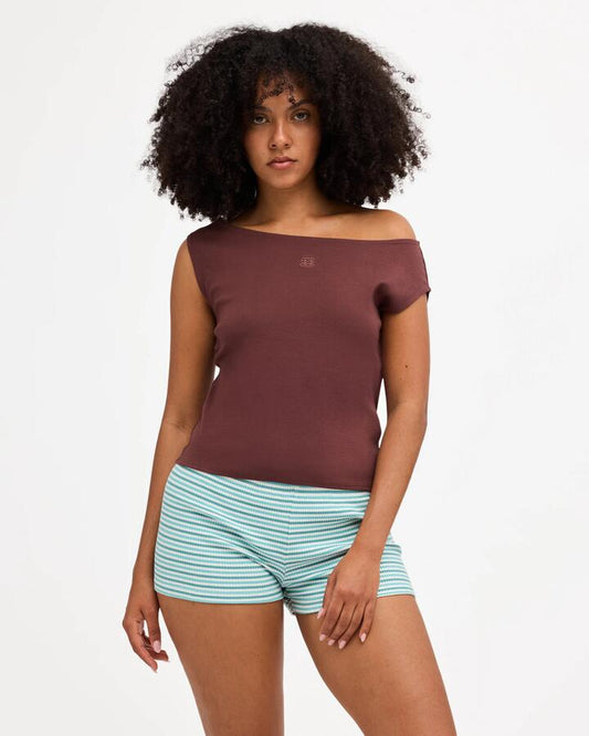 Image of a model wearing Tops. Product name - Billabong Womens Repeat Tank Top Teak in Teak colour by brand - Billabong