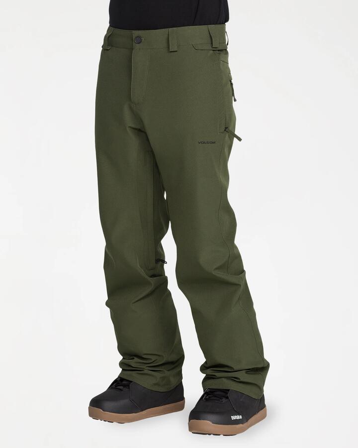 Image of a model wearing Pants. Product name - Volcom Mens Frkn Snow Chino Pants Dark Green in Dark Green colour by brand - Volcom
