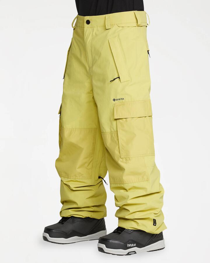 Image of a model wearing Pants. Product name - Volcom Mens Longo Gore-Tex Pants Golden Haze in Golden Haze colour by brand - Volcom