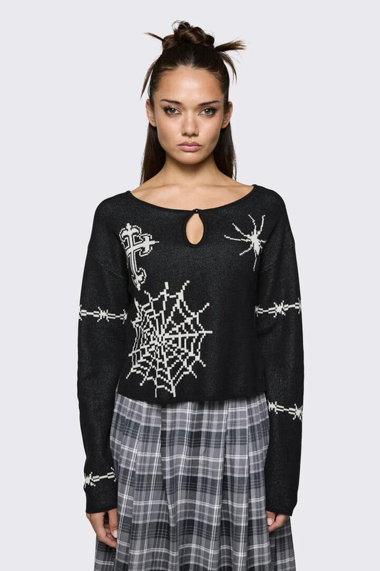 Image of a model wearing Outerwear. Product name - Spritely Graphic Knit Jumper in Black colour by brand - Black Friday