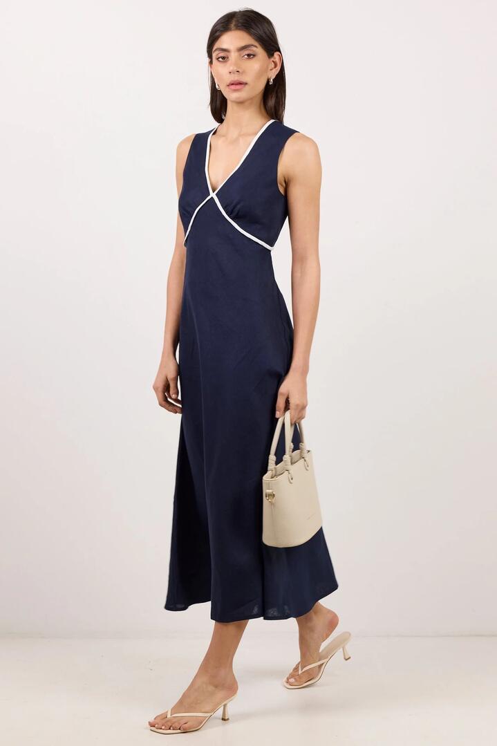 Image of Dresses. Product name - Aston Ink Linen Bias Flared Maxi Dress in Ink colour by brand - Stories be Told