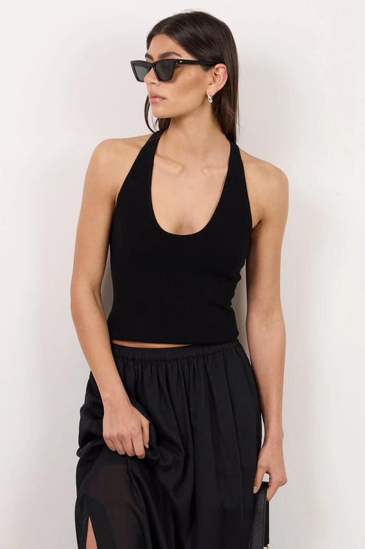 Image of a model wearing Outerwear. Product name - Ambition Black Racer Back Knit Top in Black colour by brand - Among the Brave