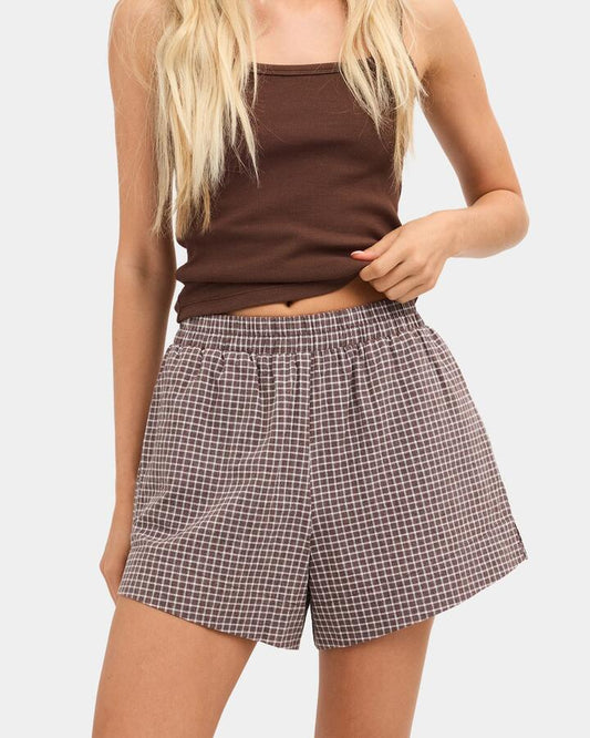 Image of a model wearing Shorts. Product name - Nunui Womens Crumpet Elastic Waist Shorts Chocolate 5 in Chocolate 5 colour by brand - Nunui