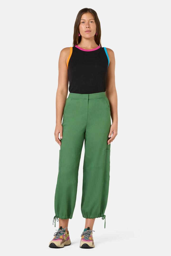 Image of a model wearing Pants. Product name - Tailored Cargo Pants in Green colour by brand - Gorman