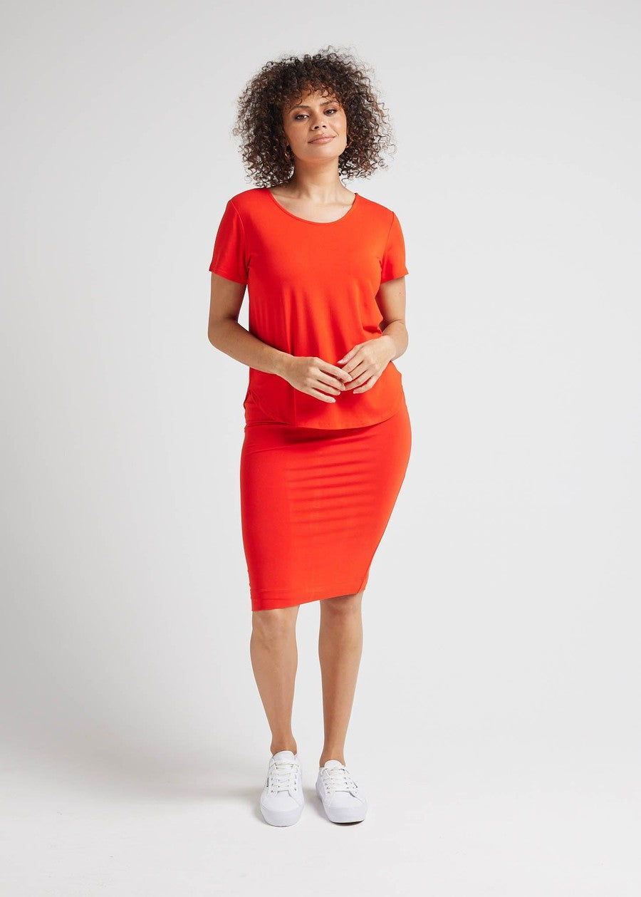 Image of a model wearing Tops. Product name - Janis Short Sleeve Bamboo T-Shirt Fiery Red in Fiery Red colour by brand - Lou Lou