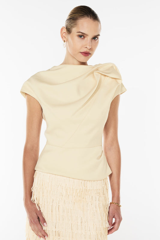 Image of a model wearing Tops. Productname: Grand Illusion Top in CHAMPAGNE colour by brand - Manning Cartell