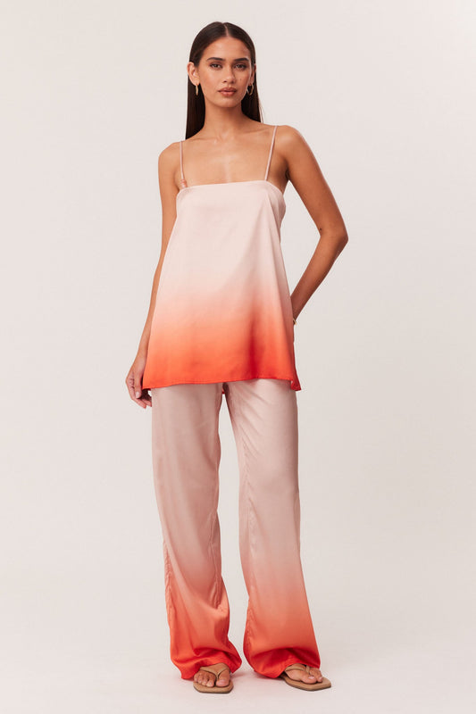 Image of a model wearing Pants. Productname: SNDYS AMAYA PANTS in Peach Ombre colour by brand - SNDYS