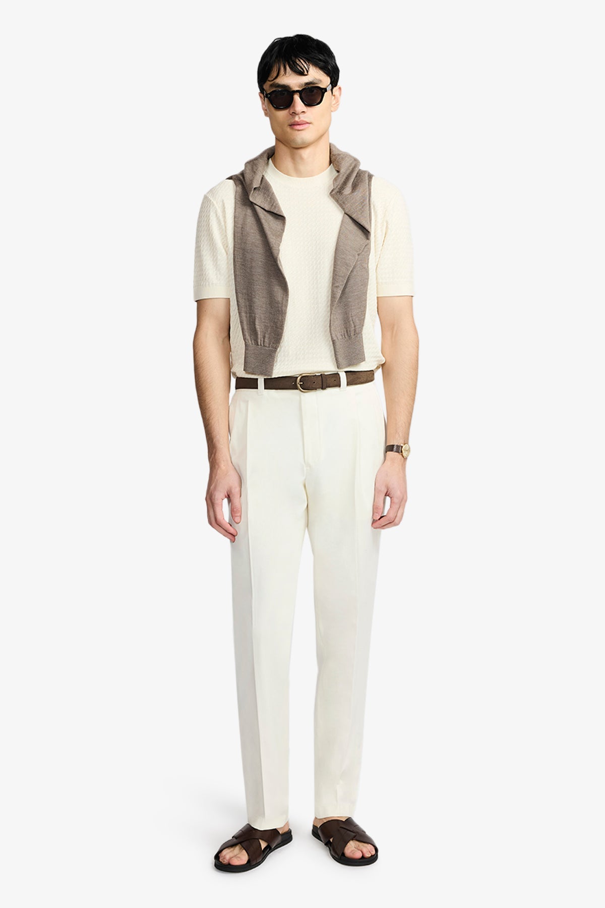 Image of a model wearing Pants. Product name - Dakota Pant Off White Twill in White colour by brand - Anthony Squires