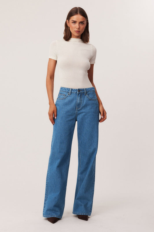 Image of a model wearing Tops. Productname: SNDYS KATYA SHORT SLEEVE TOP in Off White colour by brand - SNDYS