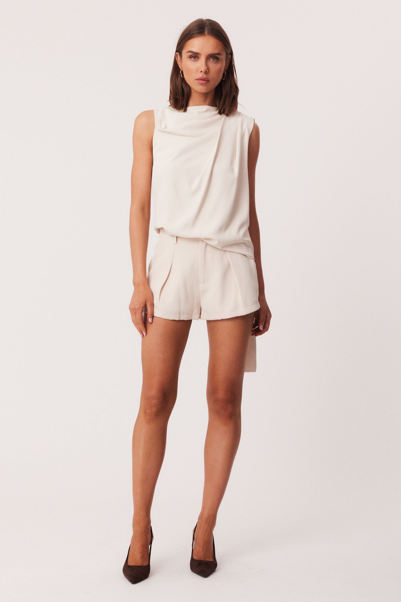 Image of a model wearing Shorts. Productname: SNDYS REECE SHORTS in Stone colour by brand - SNDYS